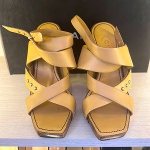 Chanel light brown sandal size 37.5. Fits more like a seven .
